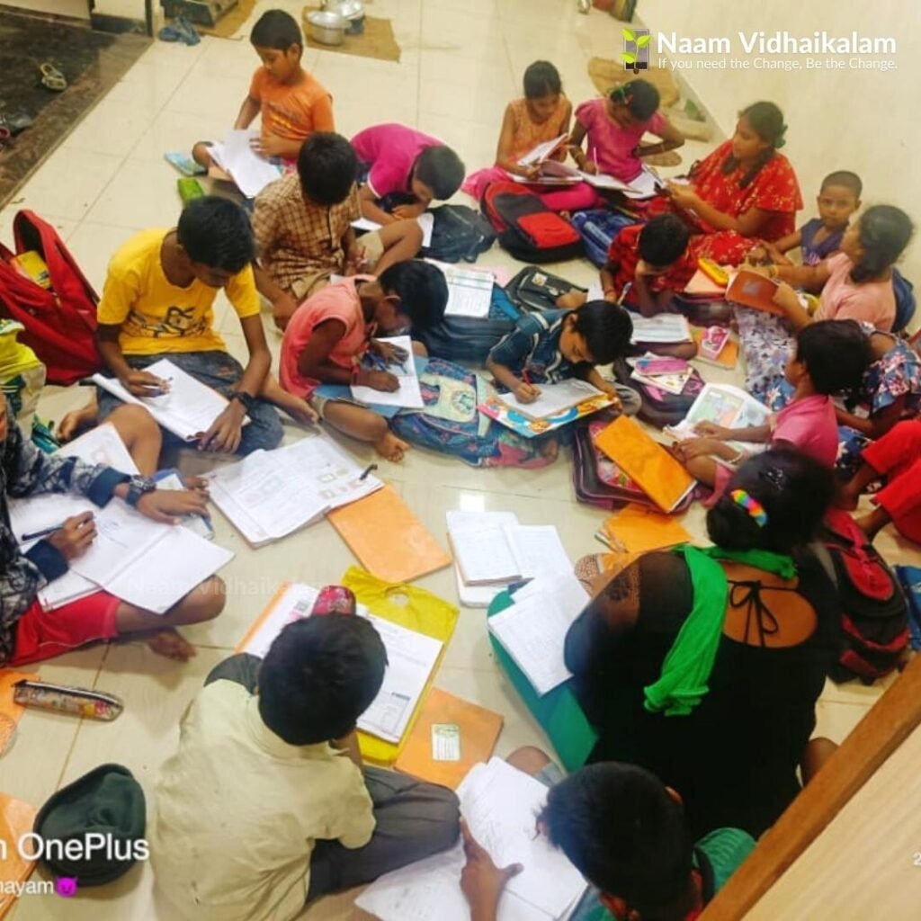 Children at a Naam Vidhaikalam session